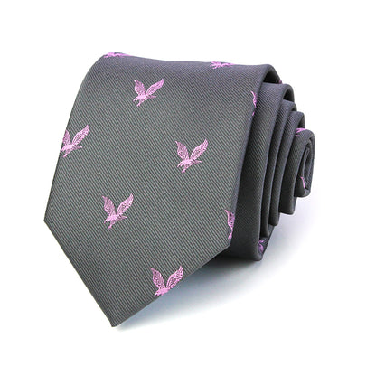 gray necktie featuring a pattern of small pink embroidered birds.