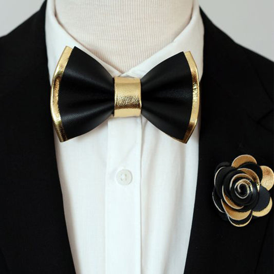 A black and gold bow tie and a matching lapel flower pin are displayed with a green box labeled "Mr. Dapper's