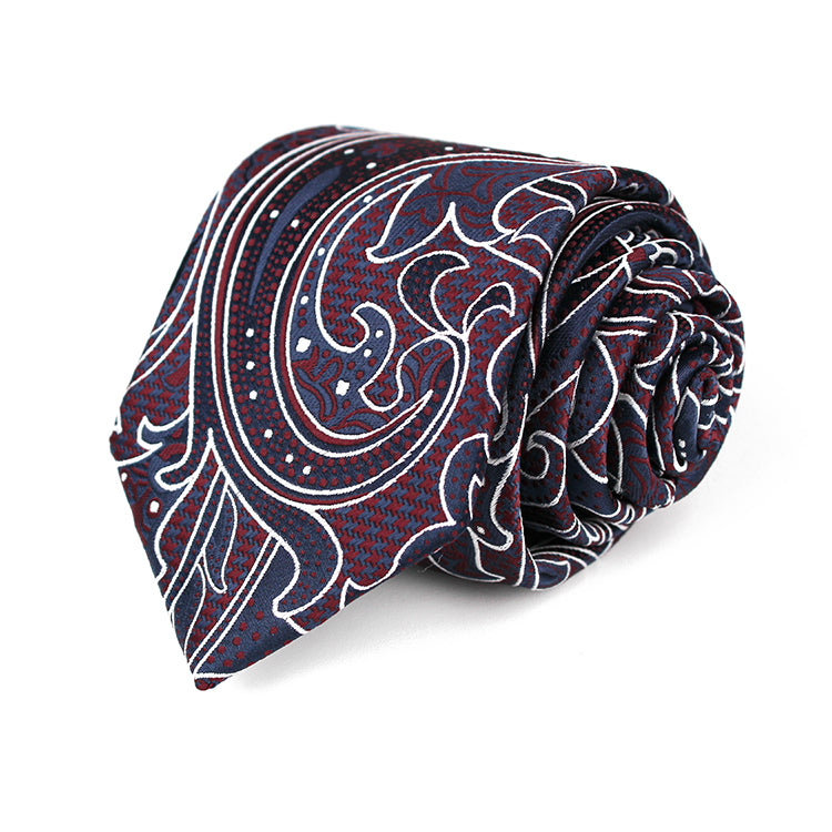 A necktie displaying a beautiful paisley motif, characterized by its flowing shapes and rich color palette.