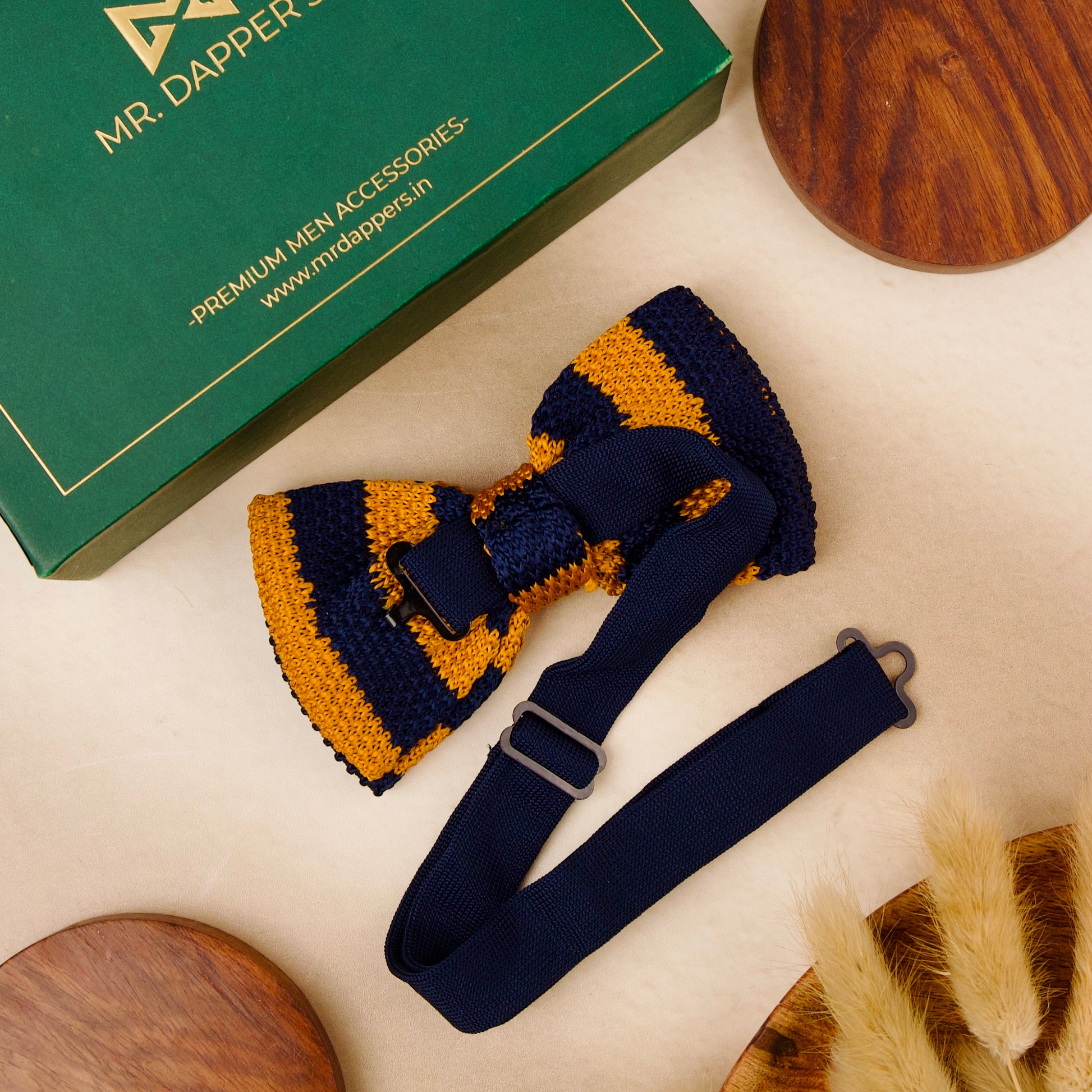 A yellow and blue striped bow tie