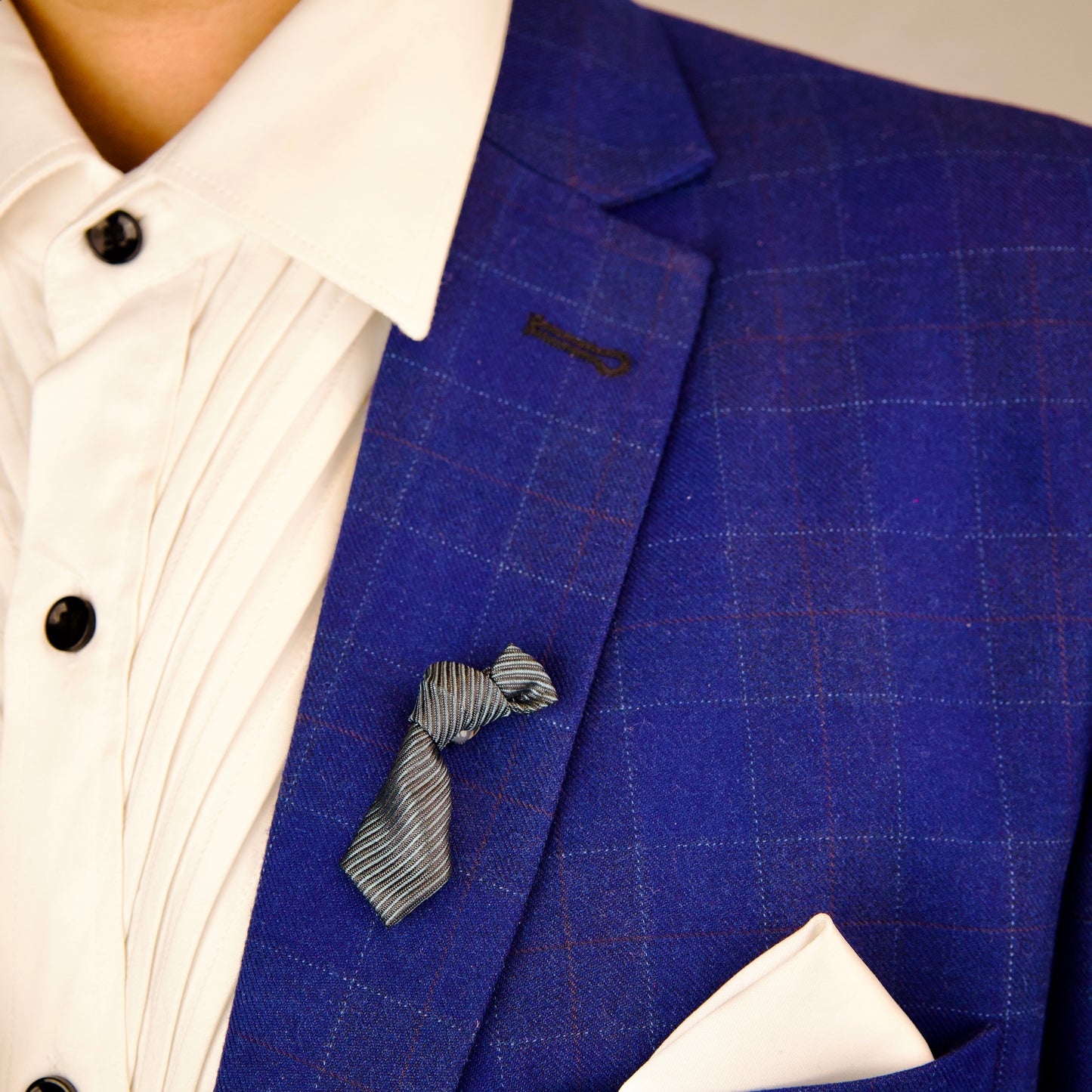 "Luxury striped tie brooch for men, perfect blend of style and durability"