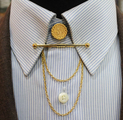 "Polished gold shirt collar bar with sterling silver trim, stylish men’s accessory"