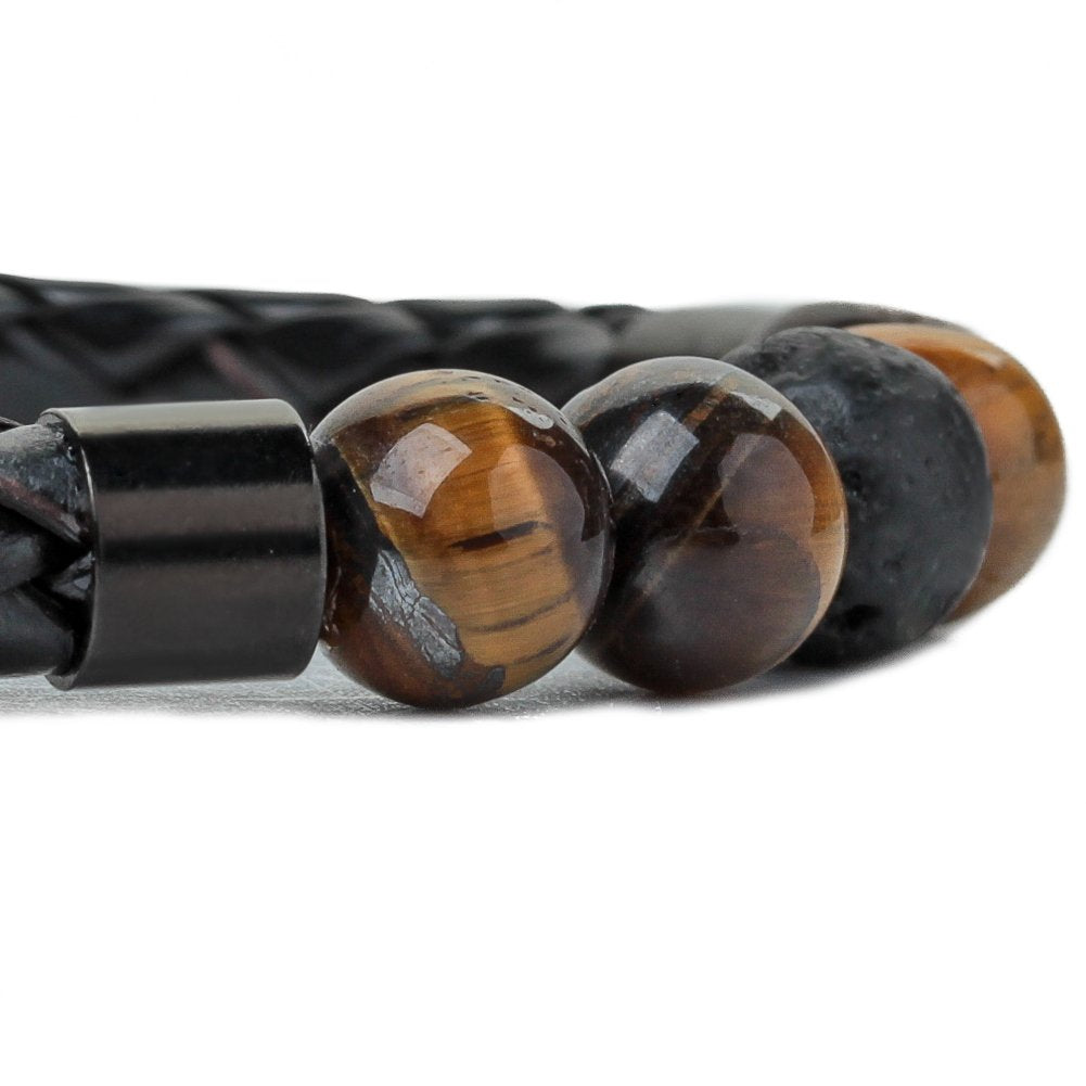 Bracelet with braided leather strap and tiger eye stones on a white background