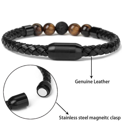 Black braided leather bracelet with beaded design and magnetic clasp on a white background