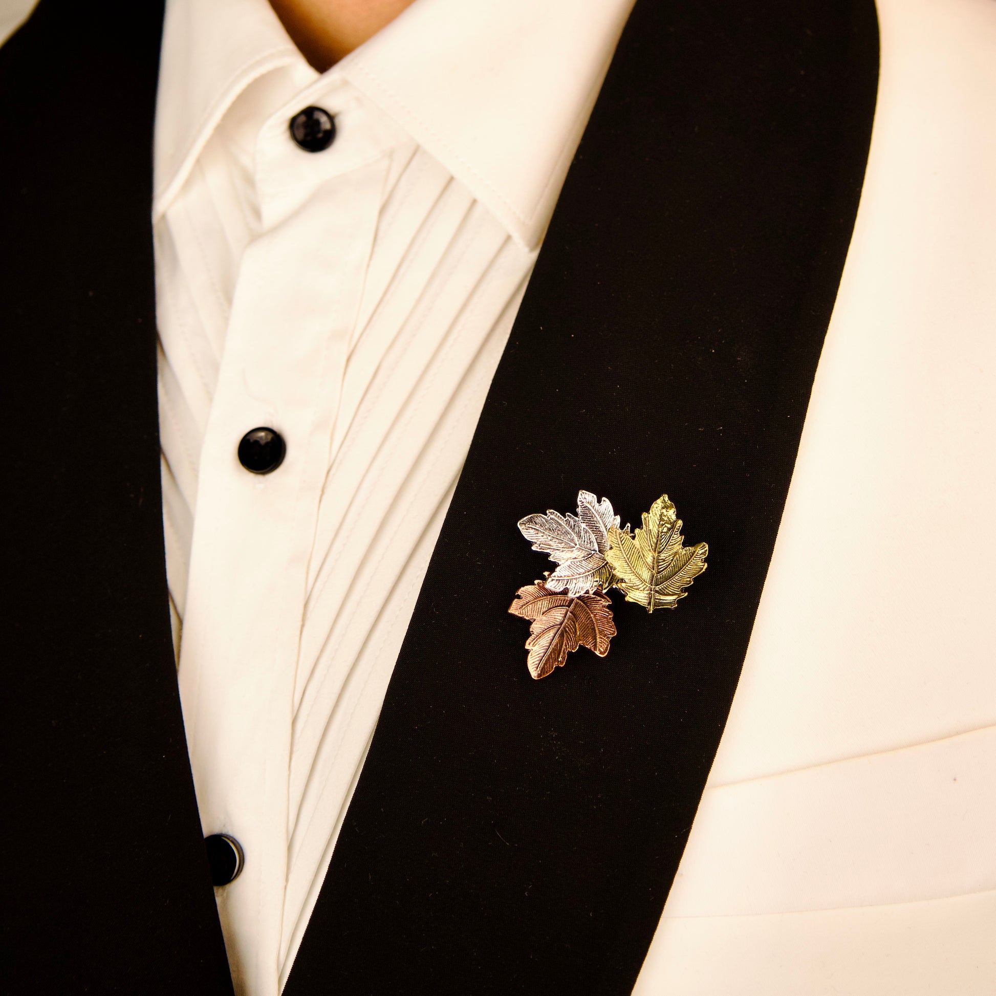 "Trio Leaflet Brooch for men, nature-inspired design with intricate leaf detailing. Sterling silver Trio Leaflet Brooch, handcrafted with three delicate leaves"