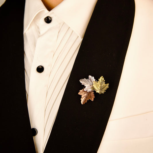 "Trio Leaflet Brooch for men, nature-inspired design with intricate leaf detailing. Sterling silver Trio Leaflet Brooch, handcrafted with three delicate leaves"