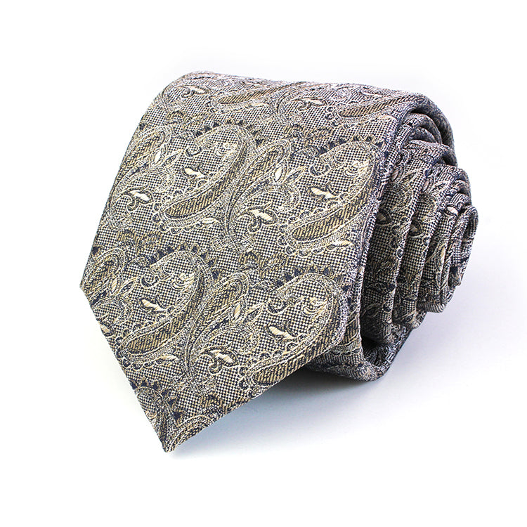 A classic necktie with a retro-inspired design, featuring intricate patterns in muted colors for a timeless, sophisticated appeal